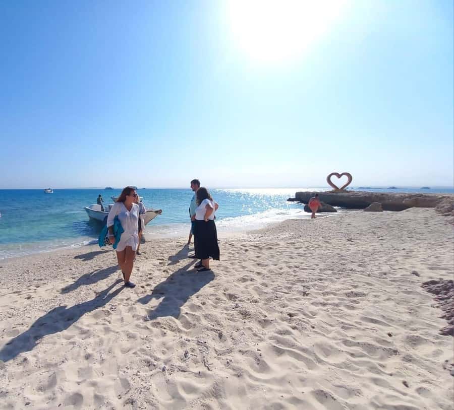 Hurghada: High-Speed Sea Taxi Tour to Orange Bay or Magawish - What happens once you land: island entry, shaded breaks, and staff help