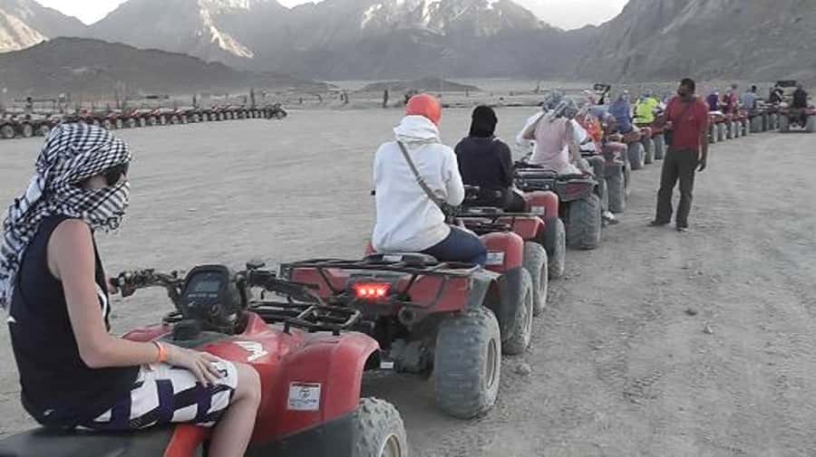 Morning Trip: Desert Safari Riding a Speed Quad Bike, Pickup - Languages and Small Details That Make a Difference